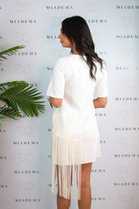 Abito bianco con frange